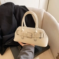 Chic cream white shell handbag in premium glossy leather with silver buckle detail - White