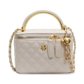 Beige quilted bucket bag with gold camellia logo and chain strap in variant view - Beige White Large