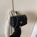 Classic black quilted chain bag in glossy patent finish with silver twist-lock closure - Black