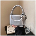 Minimalist silver metallic small square bag with knotted top handle and mirror finish - Silver