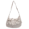 Minimalist beige canvas crossbody bag with decorative bows and adjustable strap - Off White