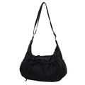 Minimalist black canvas crossbody bag with decorative double bow and adjustable strap - Black