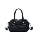 Minimalist black pebbled leather Boston handbag with wavy zipper and silver hardware - Black