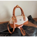 Elegante borsa bowling in tela beige e pelle marrone con manici e tracolla regolabile - Marrone