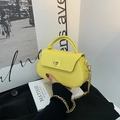 Mini yellow crossbody chain bag with gold metal lock and faux leather finish - Yellow