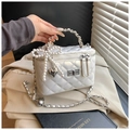 Detail of white quilted box bag with pearl bow and heart metal charm and silver chain - Pearl White (No Pendant)