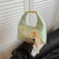 Mint green dumpling bag with pearl lace bow and golden poodle charm detail - With Pendant / Green