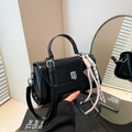 Minimalist black glossy leather crossbody bag with top handle and woven tassel charm - Black (With Charm)