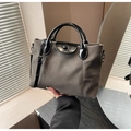 Minimalist grey and black contrast tote bag with top handle and adjustable shoulder strap - Gray