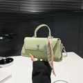 Pistachio green crossbody bag with tennis racket charm and silver swivel lock - Green (With Pendant)