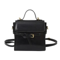 Glossy black mini handbag with gold buckle and top handle in a sleek structured design - Black