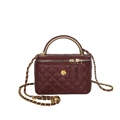 Elegant burgundy quilted bucket bag with golden metal handle and classic chain strap - Red