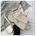 Detail of cream square bag with woven texture and silk scarf wrapped handle - Off White