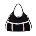 Large black tote bag with white faux fur trim and adjustable strap on white background - Black