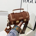 Retro brown cylinder handbag with gold rivets and colorful woven shoulder strap - Brown No Pendant