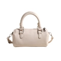Creamy white cylinder handbag with vertical wavy texture and silver hardware accents - White