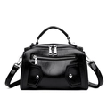 Fashionable black faux leather crossbody Boston bag with silver hardware on white background - Black