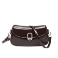 Minimalist deep brown patent leather crossbody bag with a textured silver metal buckle - Brown