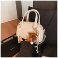 Creamy white bowling handbag with a cute brown plush bear charm and adjustable strap - White (With Charm)