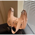 Pink crescent underarm bag with utility pockets and wide silver studded shoulder strap - Pink