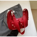Retro red underarm bag with silver eyelet strap and double pockets on grey suit - Burgundy