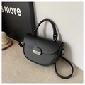Black saddle bag with textured patchwork, silver buckle and adjustable strap - Black