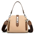 Retro bucket bag in beige lychee leather with brown trim and silver twist lock - Light Khaki