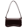 Minimalist chocolate brown leather shoulder bag with curved base and gold hardware - Brown