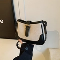 Borsa a tracolla a contrasto bianco e nero in tela con fibbie in metallo dorato - Nero