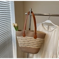 Striped straw tote bag with brown leather handles hanging against a white background - Style 7 (Without Hat)