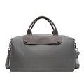Large grey travel handbag with leather flap and detachable crossbody strap in studio light - Gray