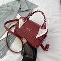 Burgundy lychee grain leather crossbody bag with silk scarf handle and silver hardware - Red