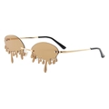 Trendsetting ocean lens sunglasses with unique gold frames and teardrop dripping lens shape - Gold Frame Tea Lens
