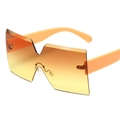 Frameless oversized sunglasses featuring orange gradient lenses and bright orange temples - Orange