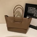 Brown lychee-grain leather tote bag with unique flap-over top handle design - Khaki