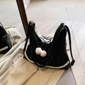 Black vintage shoulder bag with white faux fur trim and bow tie detail, autumn style - Black