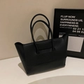 Large black tote bag in litchi grain leather with flap closure and sturdy handles - Black
