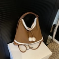 Brown canvas crossbody bag with white fleece trim and pompom drawstring details - Khaki