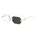 Fashionable rimless octagonal sunglasses with golden snake relief temples for women - Gold Frame Clear to Grey