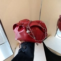 Red glossy patent leather cloud bag with silver chain and checkered ball charm - Red