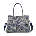 Blue faux snakeskin tote bag with glossy handles and adjustable shoulder strap - Blue