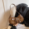Brown glossy crescent moon hobo bag with vintage buckle and pleated leather design - Brown