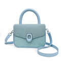 Light blue textured crossbody bag featuring contrast stitching and silver buckle detail - Blue