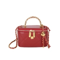 Quilted red vanity case handbag with golden chain strap and woven handle detail - Red