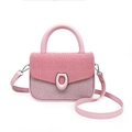 Pink patchwork crossbody bag with textured fabric flap and sleek adjustable strap - Pink