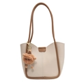 Minimalist off-white tote bag with brown straps and a cute plush ball charm - White