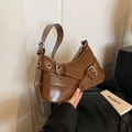 Brown patent leather moto bag with silver buckle straps and glossy mirror finish - Brown