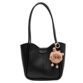 Minimalist black tote bag in matte faux leather with quirky brown plush ball charm - Black