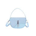 Light blue saddle crossbody bag with textured flap and silver minimalist clasp - Blue