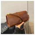 Chic brown leather crossbody bag with vintage gold clasp and sleek shoulder strap - Brown